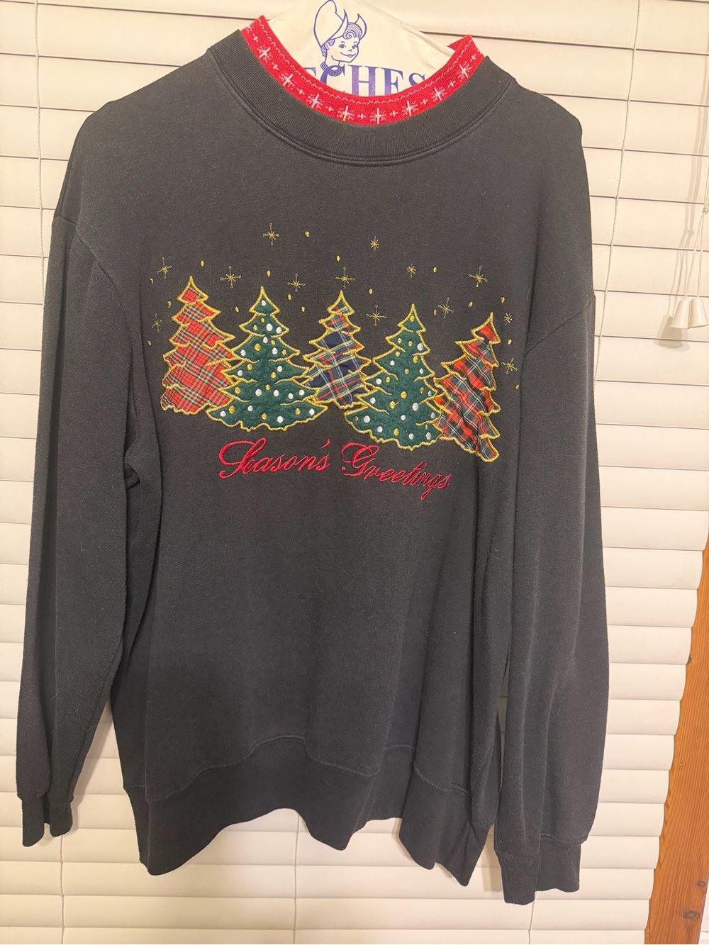 Studio Black Crewneck Sweater with Red and Green Tree Graphics